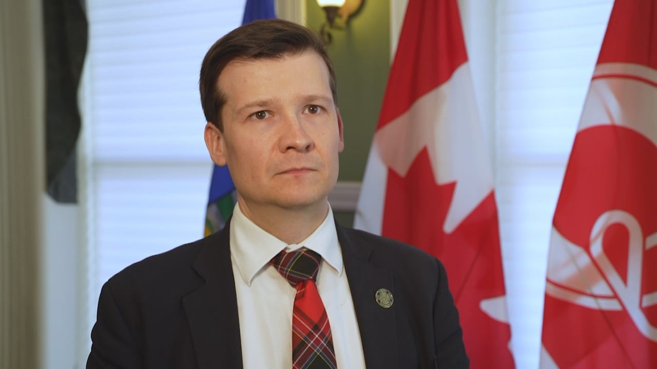 A man in a suit.