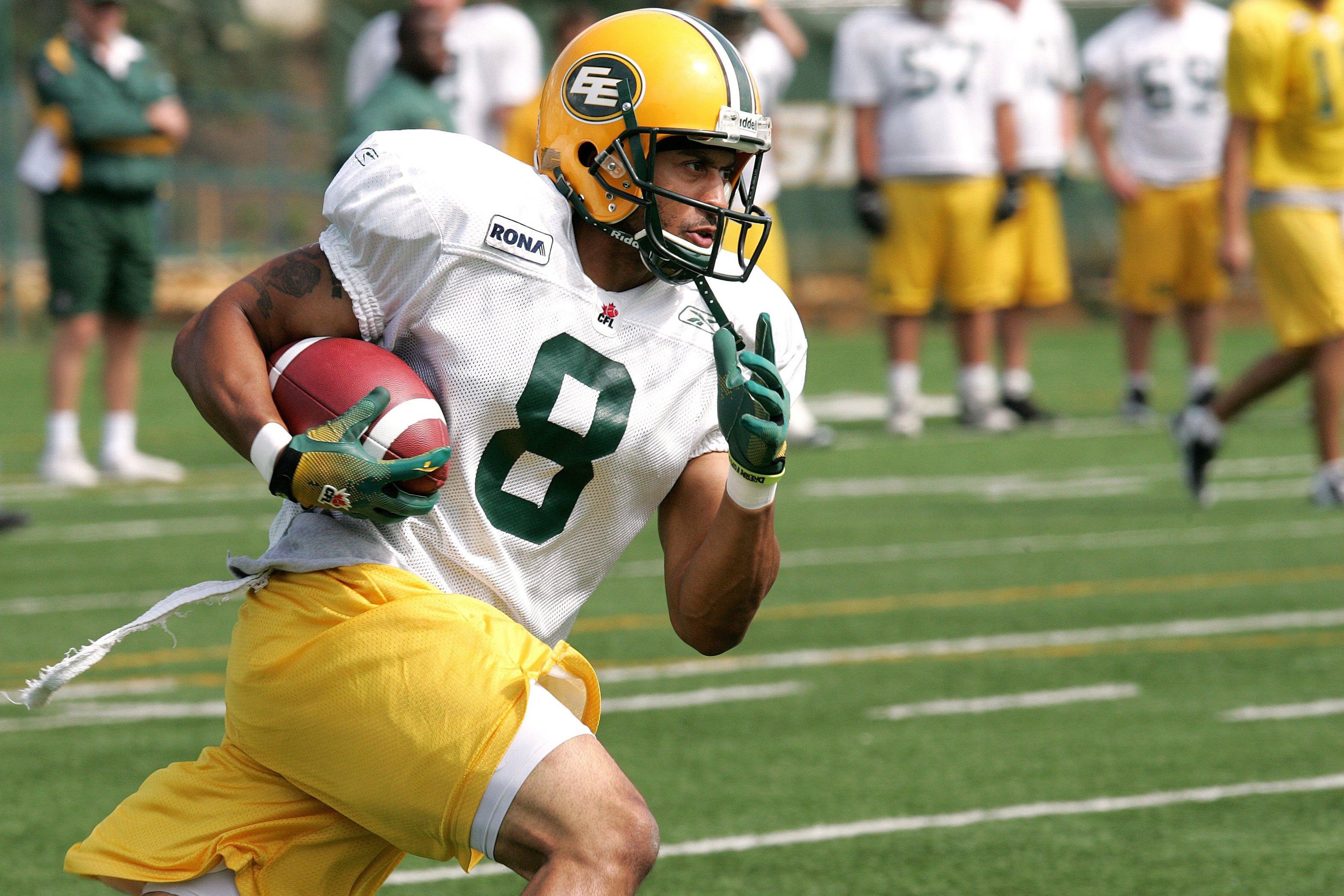 Kamau Peterson takes part in an Edmonton Eskimo team practice.