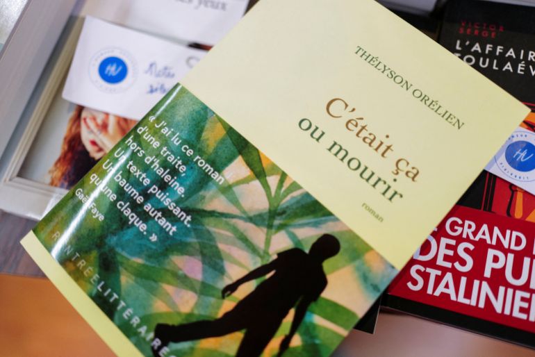 A copy of the book "C'etait ca ou mourir", a novel by author Thelyson Orelien, is displayed on a table inside a bookstore in Paris, France, September 22, 2026. REUTERS Sarah Meyssonnier