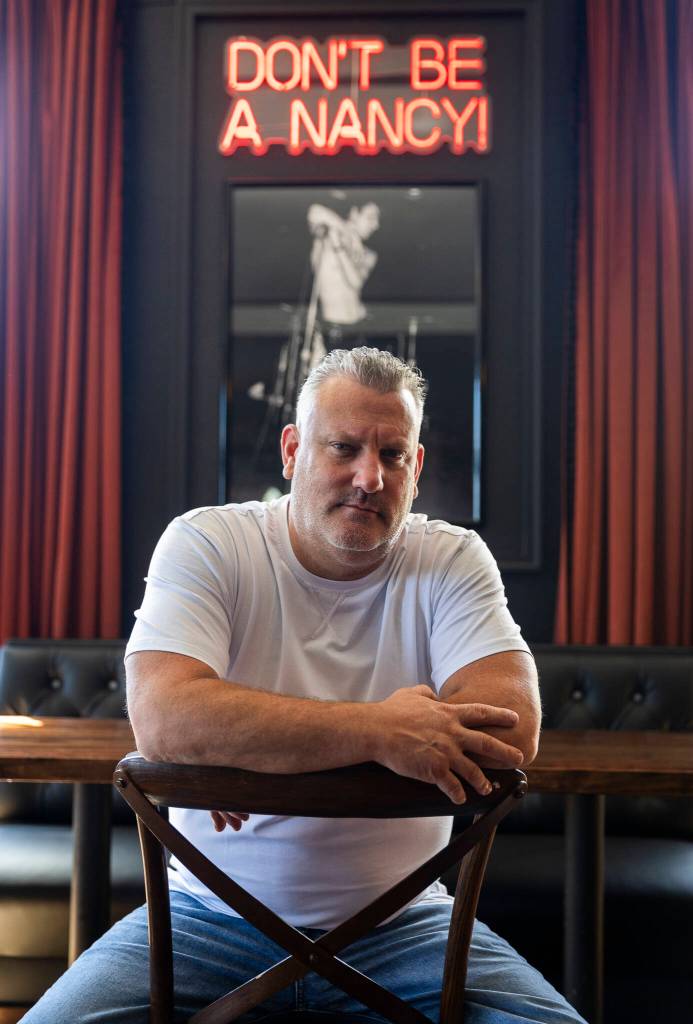 John Carswell inside El Sid, a punk-rock inspired cocktail bar and one of the final pieces of Carswell’s renovation of the APEX building on Tuesday, Aug. 12, 2025 in Everett, Washington. (Olivia Vanni / The Herald)