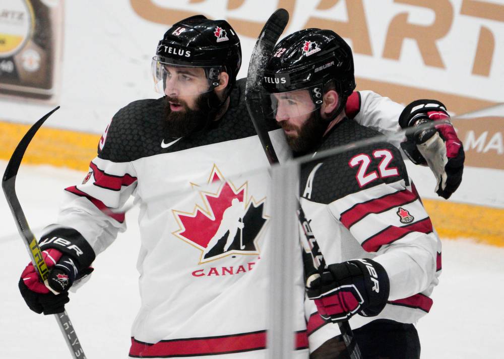 Pavel Golovkin / THE ASSOCIATED PRESS FILES
Landon Ferraro (right) celebrates with teammate Eric O’Dell (left) after scoring Team Canada’s first goal against Finland during Channel One Cup action back in 2021. After his tenure in the NHL, the forward played in the AHL before playing on three separate German clubs. Ferraro represented Canada at the 2022 Beijing Olympics before hanging up his skates in 2023.