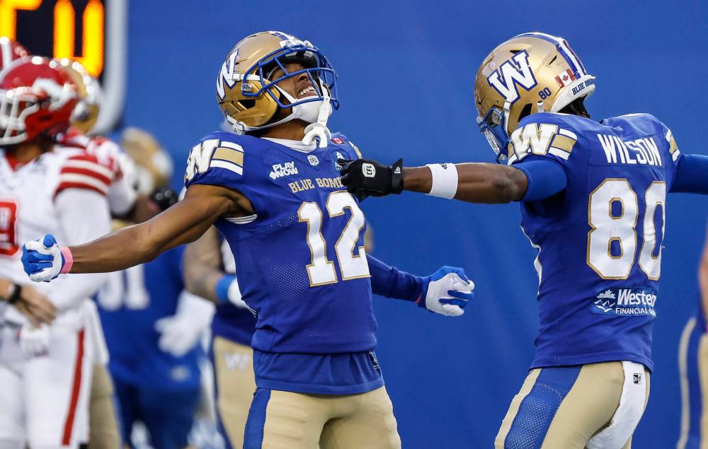 John Woods / THE CANADIAN PRESS
The Winnipeg Blue Bombers had their top four receivers in the lineup — including Tim White (left) and Ontaria Wilson (right) — in the lineup for the second time this season on Saturday.