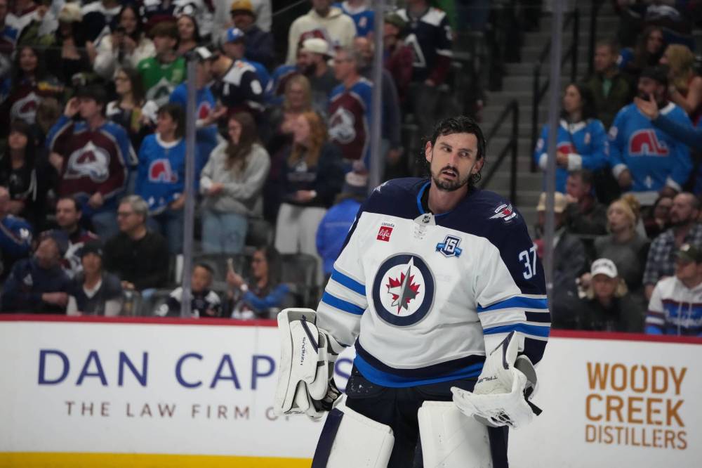 DAVID ZALUBOWSKI/ THE ASSOCIATED PRESS FILES
Thursday marks Day 29 of Winnipeg Jets franchise goaltender Connor Hellebuyck’s suspension this season after not reporting to training camp.