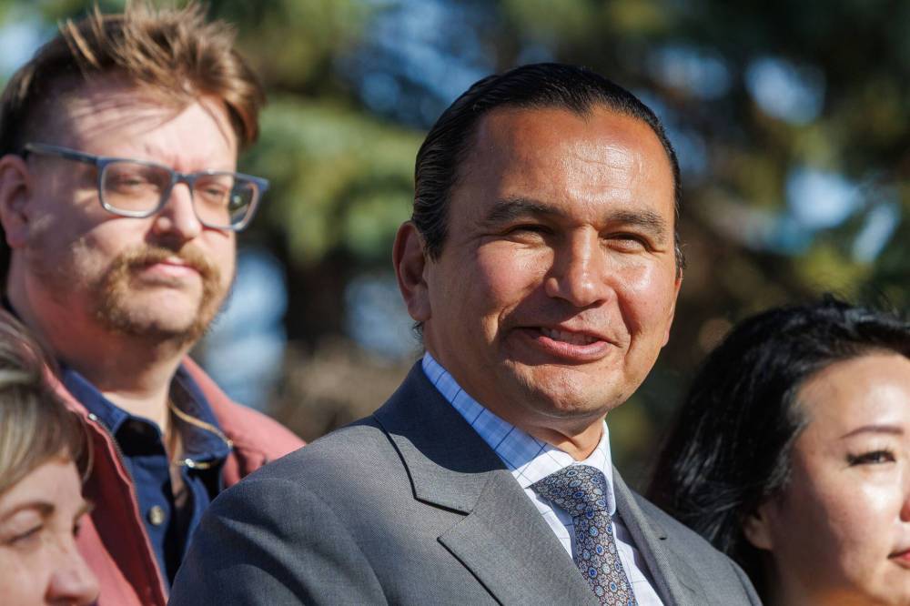 (Mike Deal / Free Press) Premier Wab Kinew announced his government is changing regulations to strengthen protections for renters, during a press conference across from the Courts of St. James, a major high-rise apartment complex on Portage Avenue, on Tuesday.