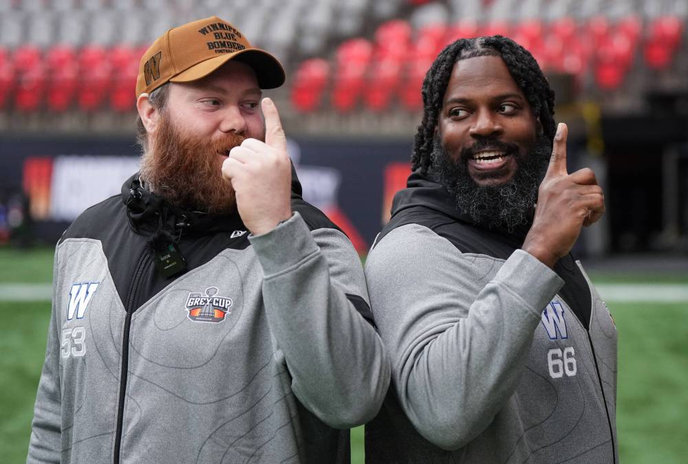 Darryl Dyck / THE CANADIAN PRESS FILES
Winnipeg Blue Bombers offensive linemen Patrick Neufeld (left) and Stanley Bryant (right) are two of the club’s veteran core that have been part of the golden-era run of two Grey Cups and five championship game appearances between 2019 and 2024.