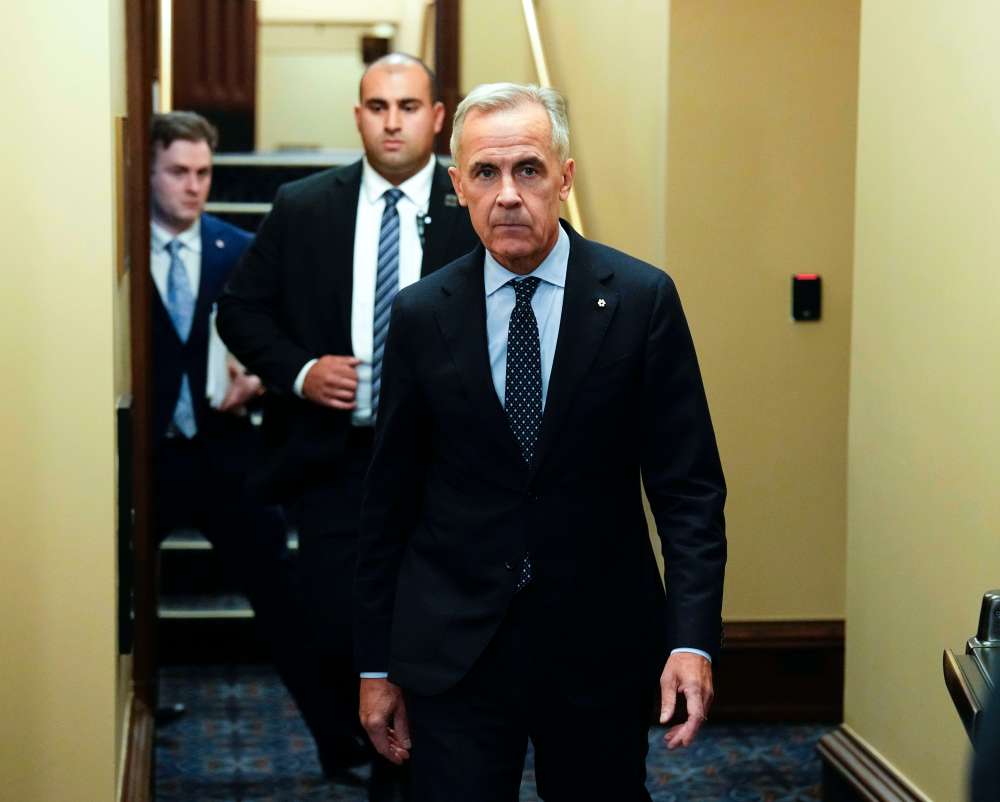 Prime Minister Mark Carney makes his way to Question Period in the House of Commons on Parliament Hill in Ottawa on Wednesday, Oct. 7, 2026. THE CANADIAN PRESS/Justin Tang