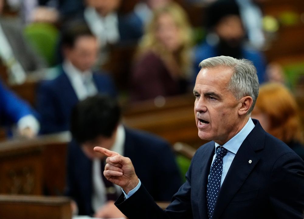 Prime Minister Mark Carney rises during question period in the House of Commons on Parliament Hill in Ottawa on Wednesday, Oct. 7, 2026. THE CANADIAN PRESS/Justin Tang
