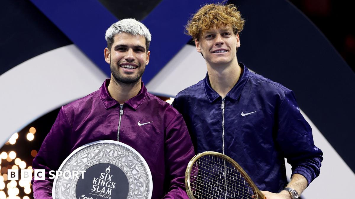 Carlos Alcaraz and Jannik Sinner pose with their prizes at the 2025 Six Kings Slams