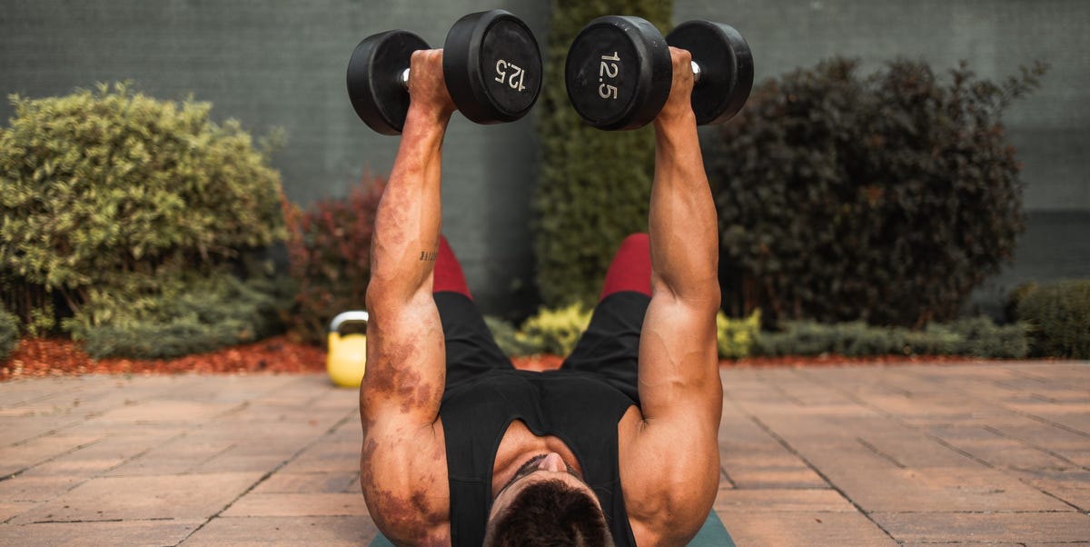 The Dumbbell Floor Fly Is the Shoulder-Friendly Way to Build Chest Muscle After 40 – Here's Why it Works