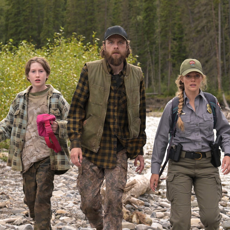 (l r) grayson taylor day as austin davies, roger leblank as jake davies, and tracy spiridakos as anna pigeon in anna pigeon on usa network. photo credit: michelle faye/usa network © versant media 2025. all rights reserved