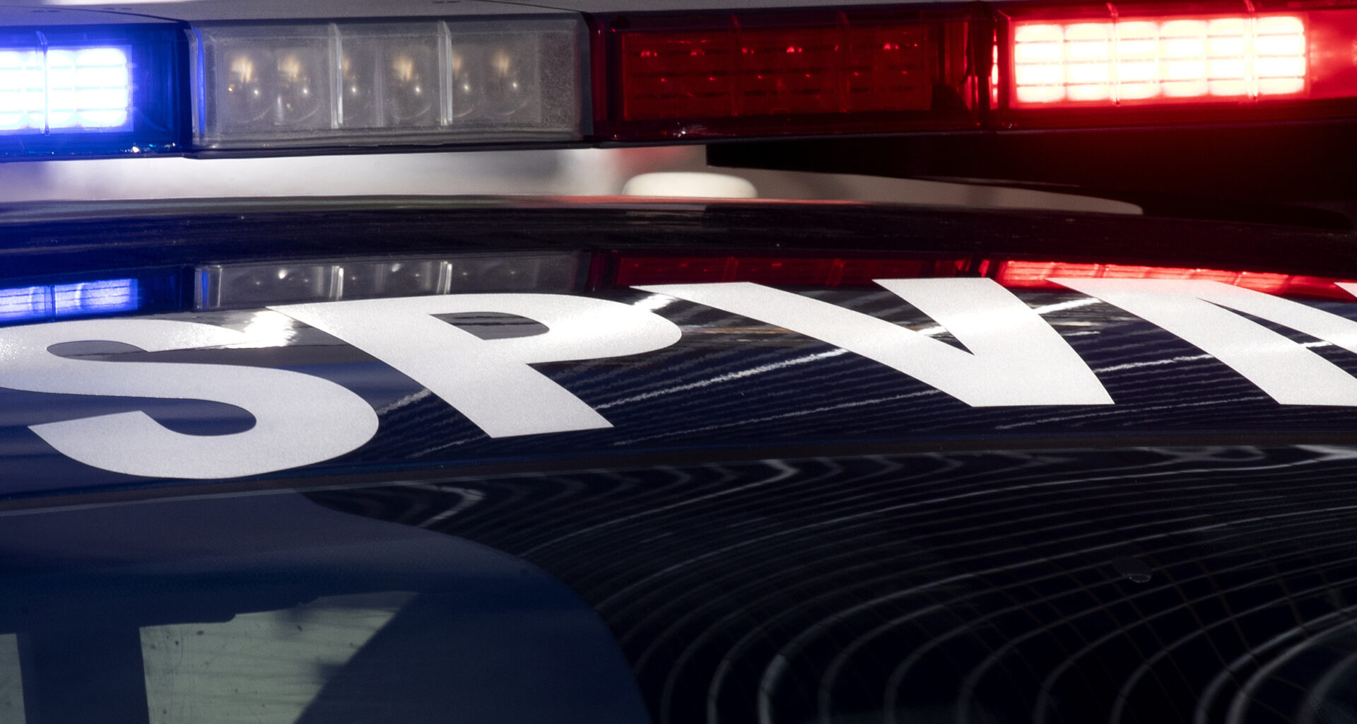 A closeup of an SPVM police car's red and blue lights.