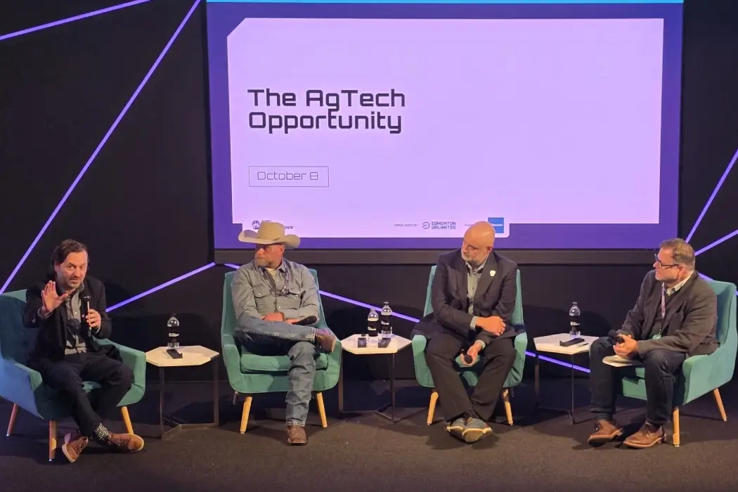 Four panellists sit on stage at Edmonton Tech Week.