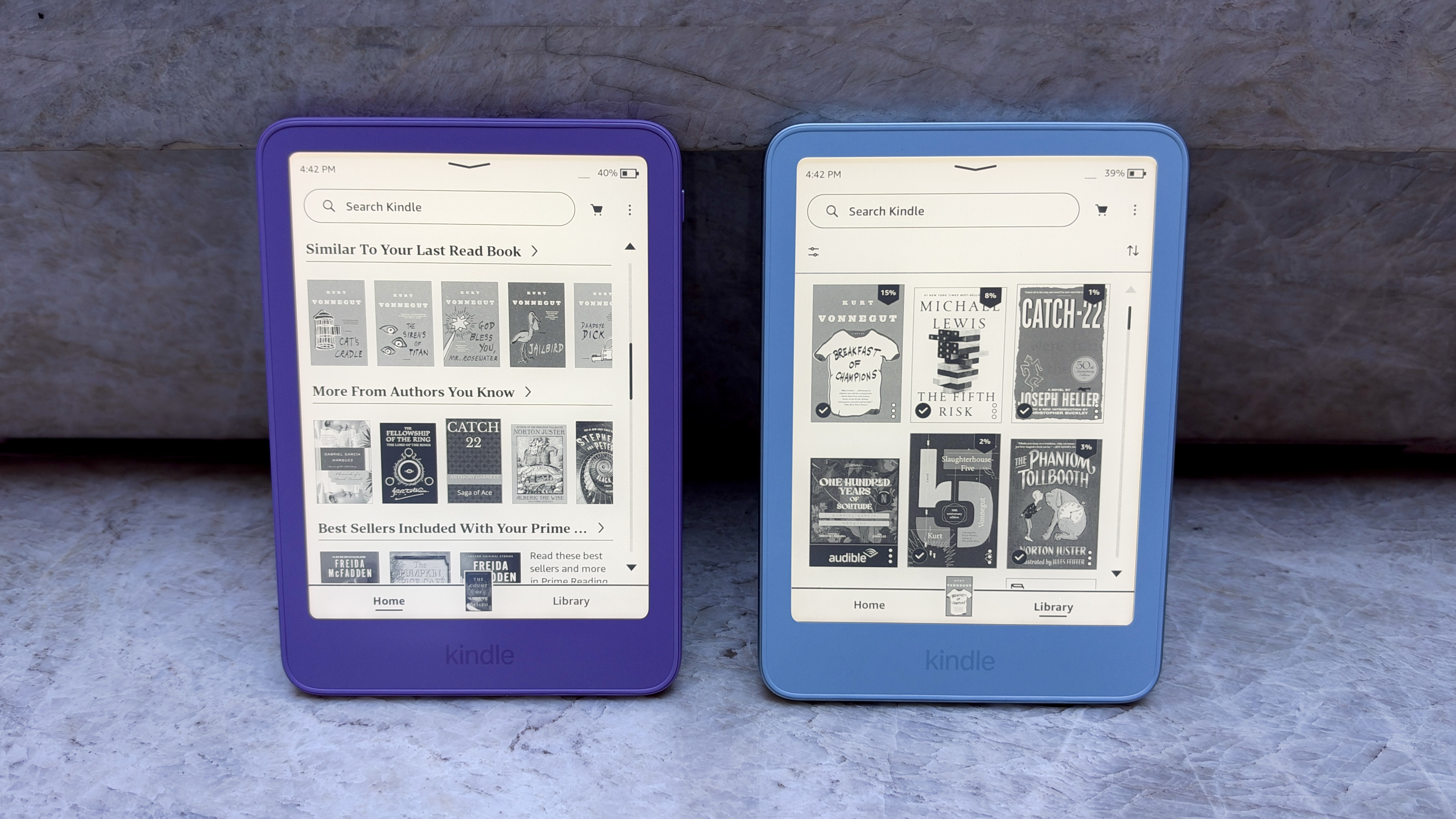 The two versions of the base Kindle 2026 shown side by, with the ube model featuring a plastic back. 