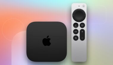 Apple TV 4K and remote on a pale background