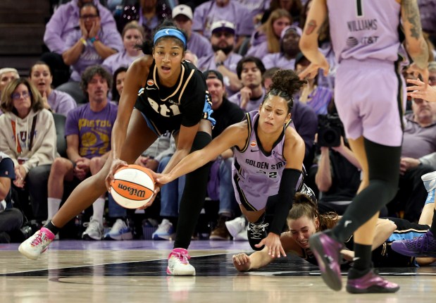 Golden State Valkyries' Veronica Burton #22 battles for a loose ball with Atlanta Dream's Angel Reese #5 in the third quarter of their WNBA game at the Chase Center in San Francisco, Calif., on Monday, October 26, 2026. (Jane Tyska/Bay Area News Group)