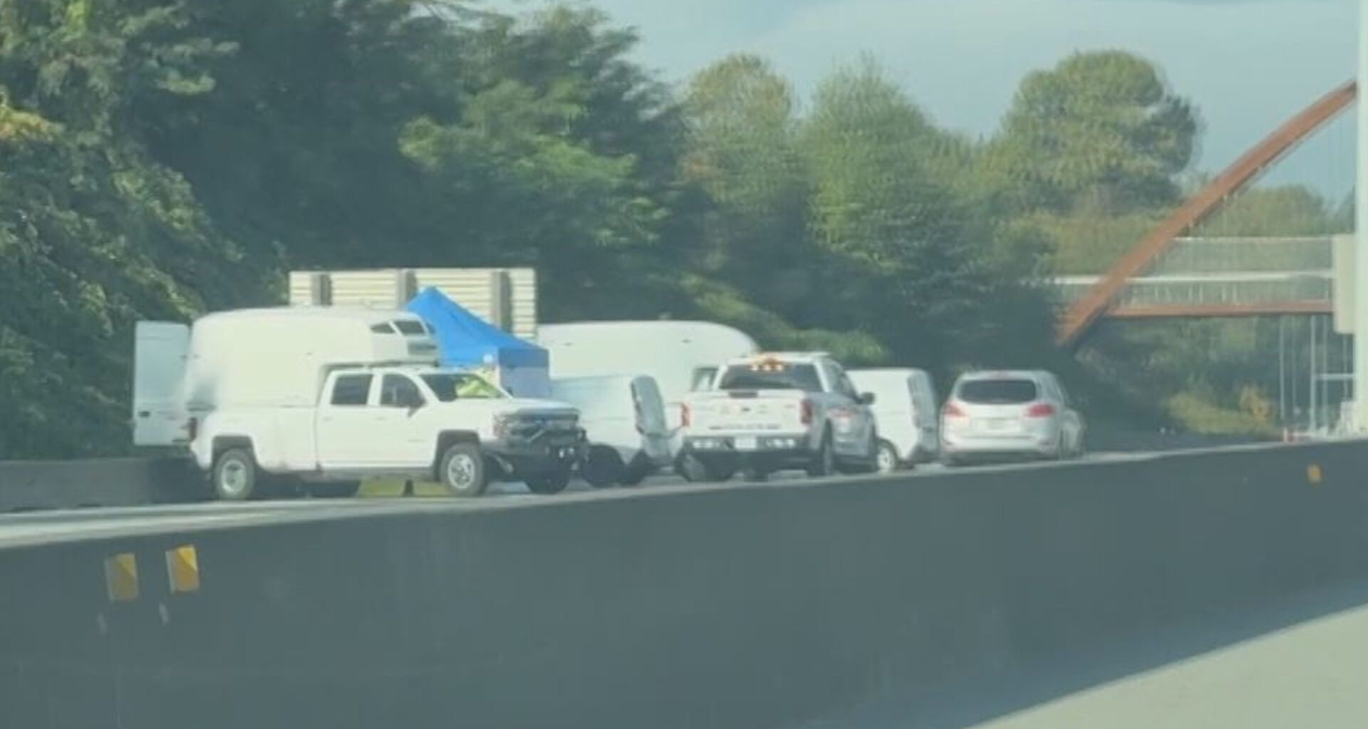 Police investigating after man's body found on HWY 1 in Burnaby