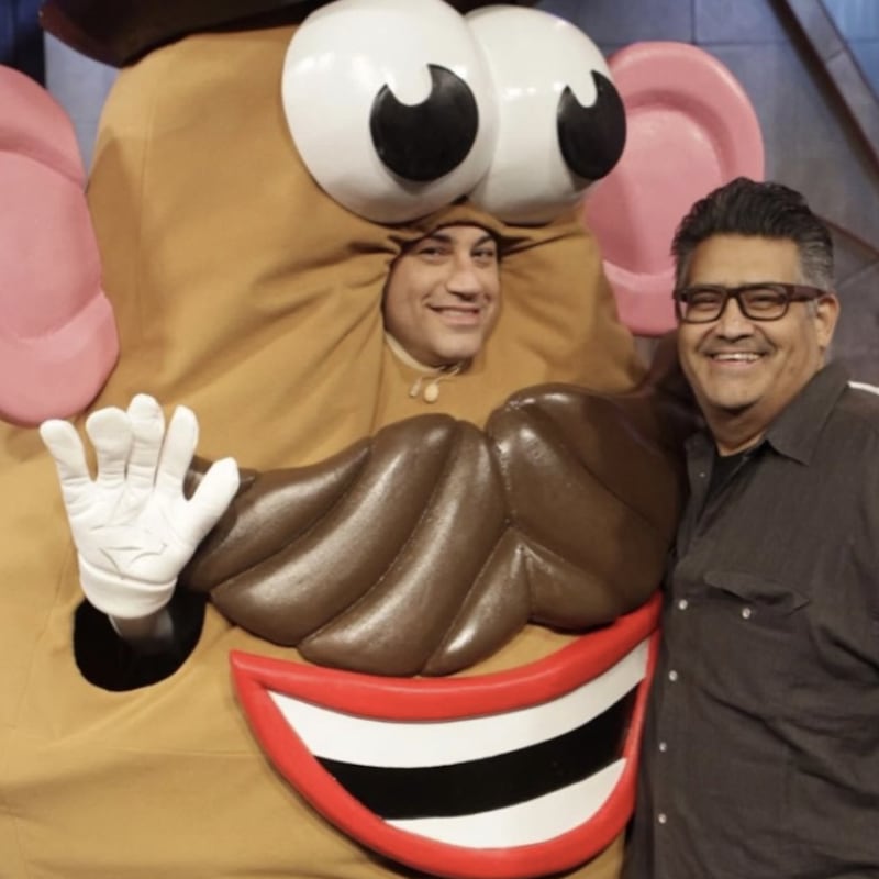 Jimmy Kimmel poses as Mr. Potato Head with the help of costume designer Rodney Munoz.