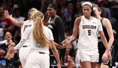 Angel Reese #5 of the Atlanta Dream reacts with Naz Hillmon #00 and Jordin Canada #3 after drawing a foul on a basket against the New York Liberty during the fourth quarter of game one of the semifinals of the WNBA playoffs.
