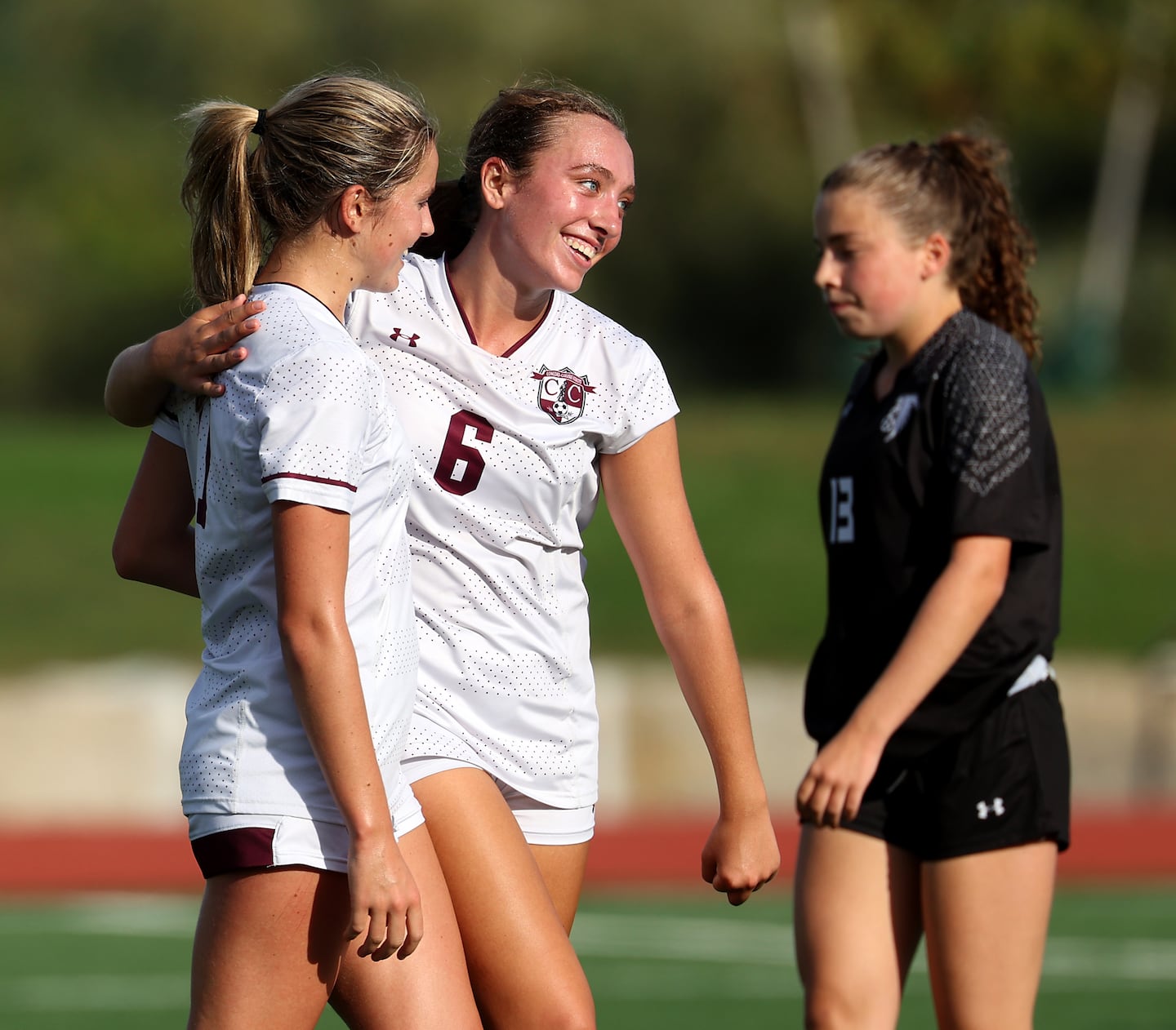 Camy Cox (center) and Concord-Carlisle rose to No. 2 in this week's Top 20 thanks to a 6-0-0 start. 
