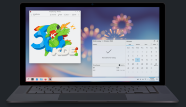 A laptop sits with an open window showing the date is Oct 14, 2026, and another with a logo celebrating KDE's 30th birthday.