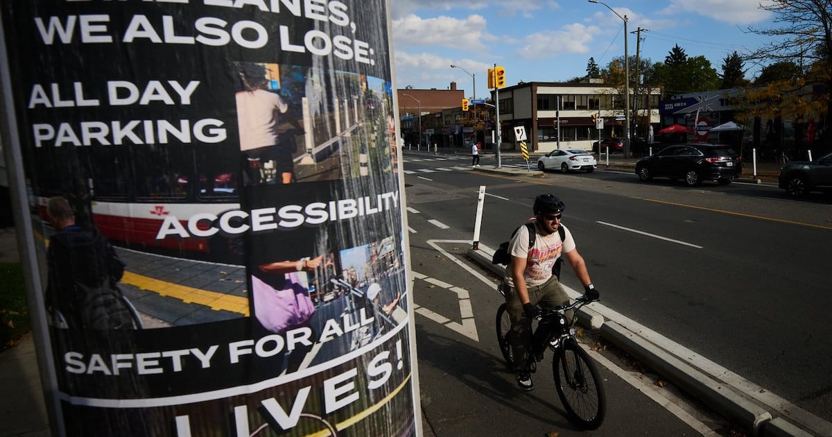 Bloor Street Toronto bike lane: Protest blocks removal work