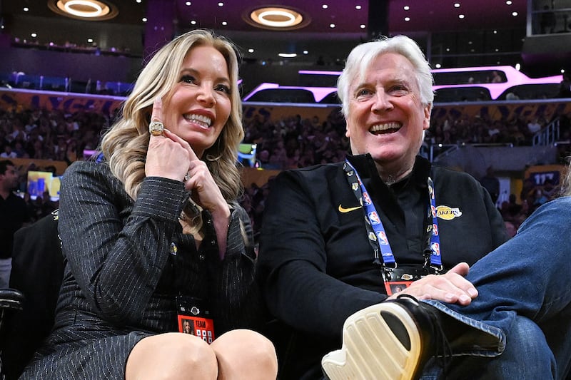 LOS ANGELES, CALIFORNIA - OCTOBER 21: Jeanie Buss (L) and Mark Walter attend a basketball game between the Los Angeles Lakers and the Golden State Warriors at Crypto.com Arena on October 21, 2025 in Los Angeles, California. NOTE TO USER: User expressly acknowledges and agrees that, by downloading and/or using this Photograph, user is consenting to the terms and conditions of the Getty Images License Agreement. (Photo by Allen Berezovsky/Getty Images)