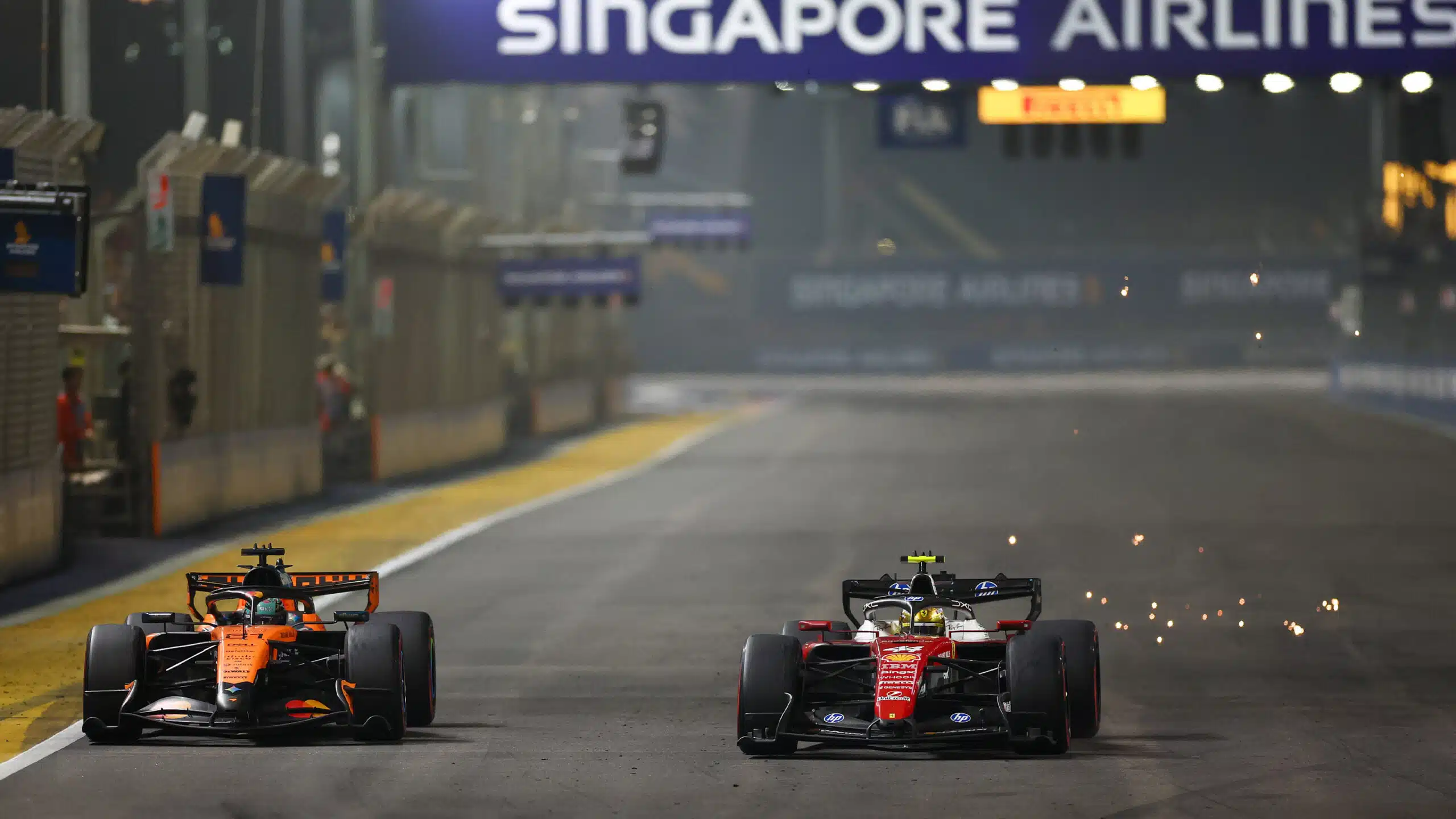 Oscar Piastri battles with Lewis Hamilton in the 2026 Singapore GP