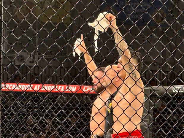 Santa Cruz native Willy LaMacchia, left, and San Jose's Chris Chapa both expect to be declared the winner of their MMA lightweight bout at LFA 243 at KP Arena in Santa Cruz on Friday. Chapa won by split decision. (Jim Seimas - Santa Cruz Sentinel)