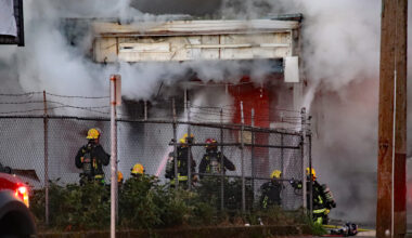 Fire at Surrey strip mall started by a car fire