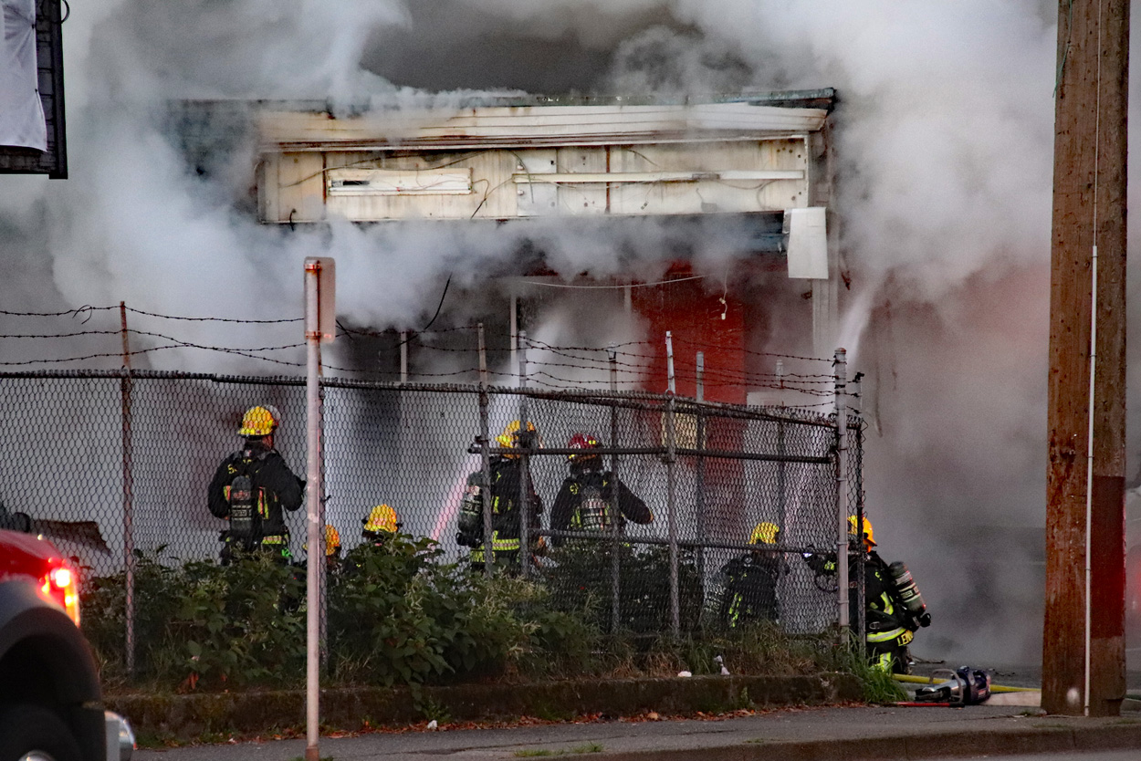 Fire at Surrey strip mall started by a car fire