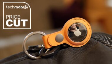 Apple AirTag 2 in a keyring holder, attached to a bag.