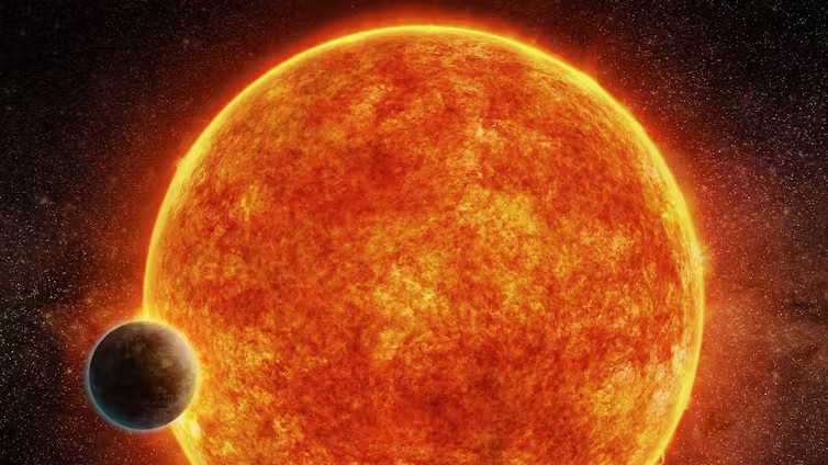 Exoplanet atmosphere: A big orangish sun-looking star with a dark planet in front.
