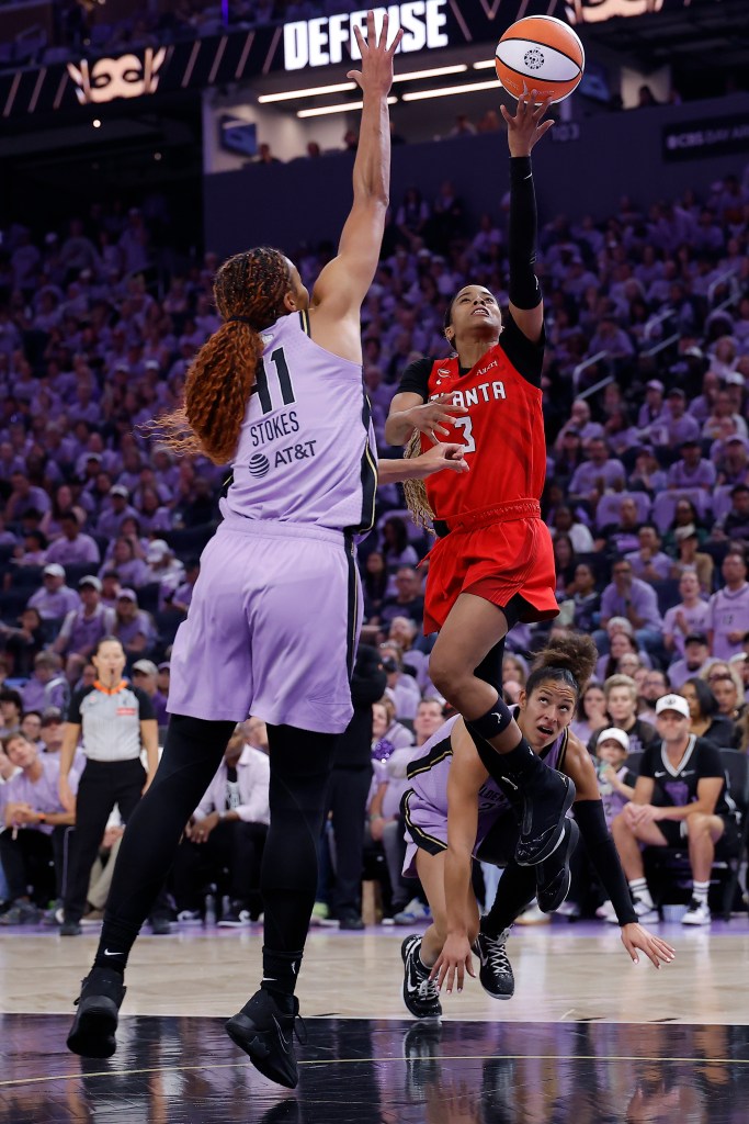 Atlanta Dream guard Jordin Canada shoots a layup against Golden State Valkyries center Kiah Stokes during the WNBA Finals.
