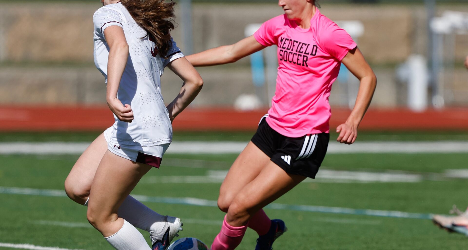 Daughter of U.S. soccer legend creates own legacy at Medfield with mom in stands