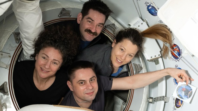 The four members of NASA’s SpaceX Crew-12 mission pose for a portrait inside the vestibule between the SpaceX Dragon spacecraft and the International Space Station. Clockwise from left, are crewmates Jessica Meir, Jack Hathaway, Sophie Adenot, and Andrey Fedyaev. Credit: NASA/Anil Menon