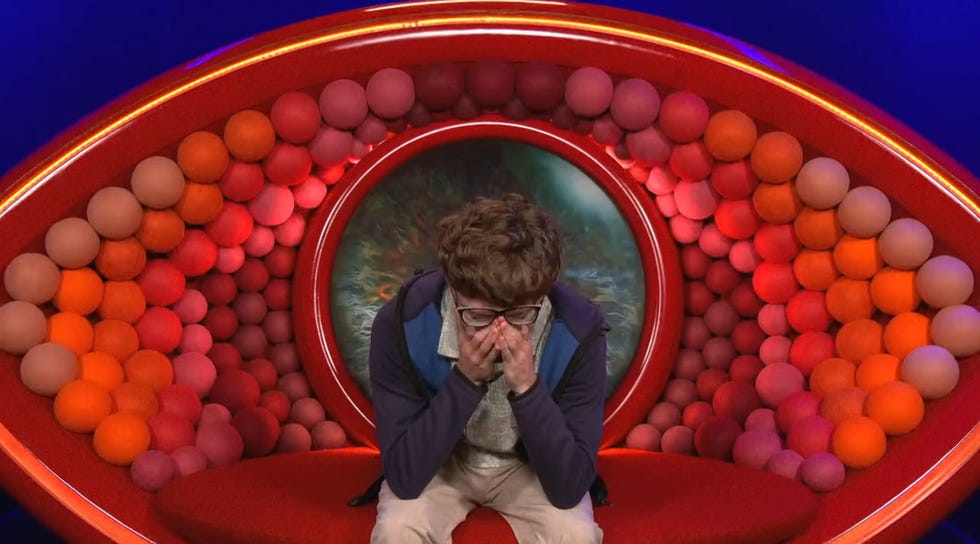 Big Brother 2026, Samuel, Diary Room big brother 2026, samuel sat in diary room with hands covering face.