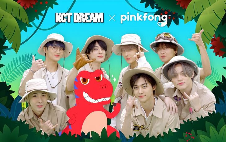 K-pop boy group NCT Dream poses with Pinkfong’s Red Rex in a promotional image for the group’s collaboration with the children’s entertainment brand. Courtesy of The Pinkfong Company