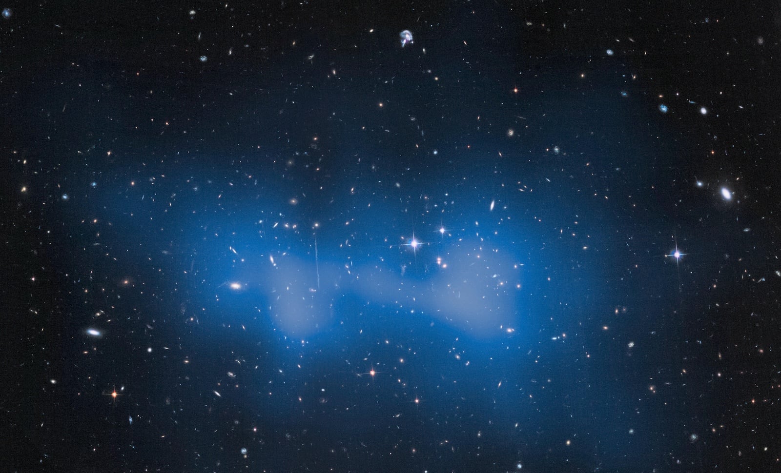 Hubble image of the El Gordo supercluster with the estimated dark matter highlighted in blue. Credit: NASA Hubble