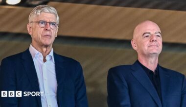 Arsene Wenger and Gianni Infantino stood alongside one another
