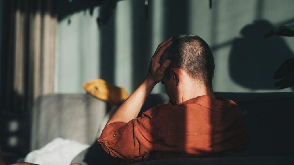 A person experiencing a migraine.