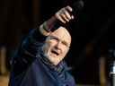 Phil Collins performs onstage during his 