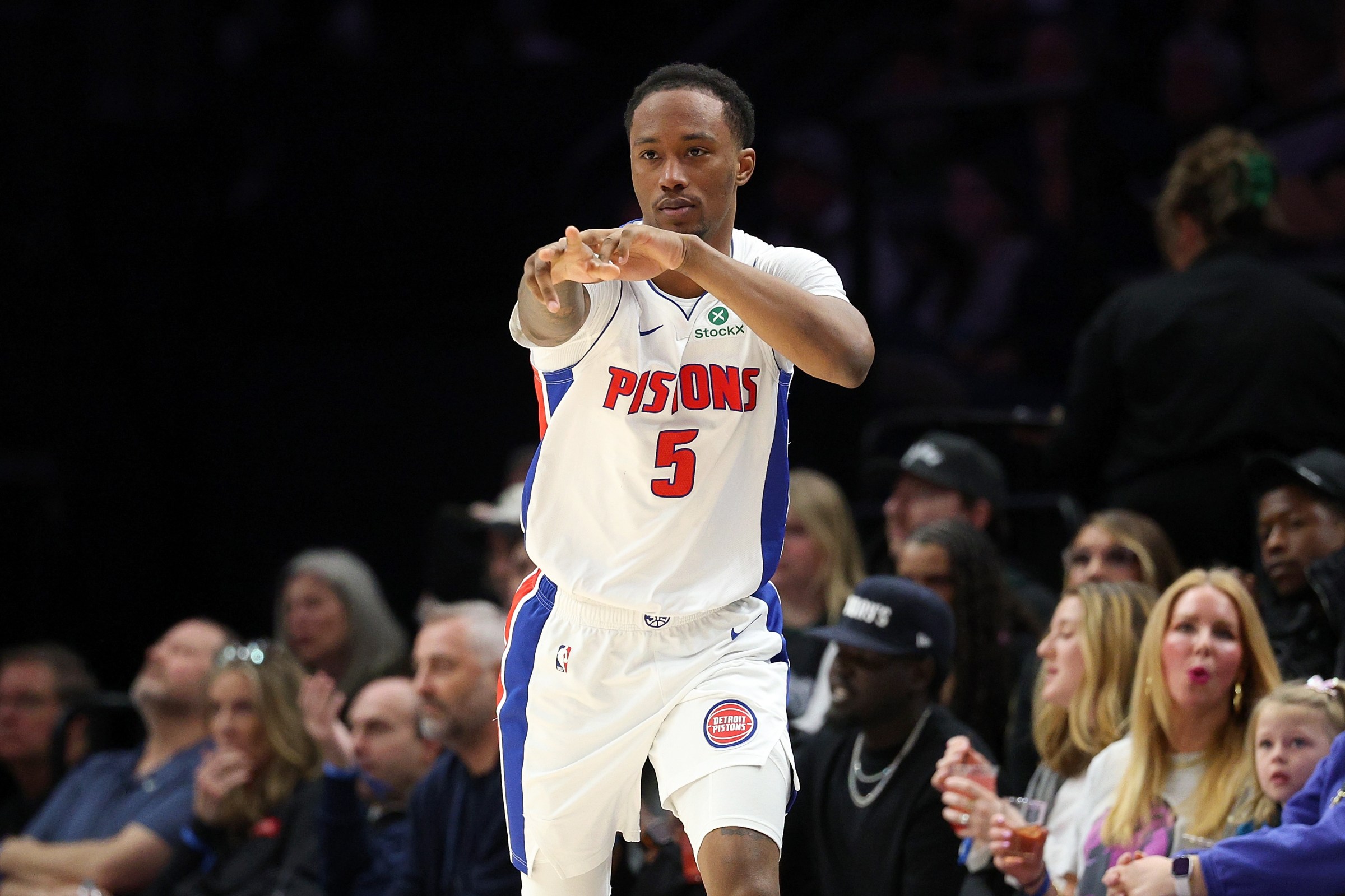 MINNEAPOLIS, MINNESOTA - MARCH 28: Ronald Holland II #5 of the Detroit Pistons celebrates his three-point basket against the Minnesota Timberwolves in the third quarter at Target Center on March 28, 2026 in Minneapolis, Minnesota. The Pistons defeated the Timberwolves 109-87. NOTE TO USER: User expressly acknowledges and agrees that, by downloading and or using this photograph, User is consenting to the terms and conditions of the Getty Images License Agreement. (Photo by David Berding/Getty Images)