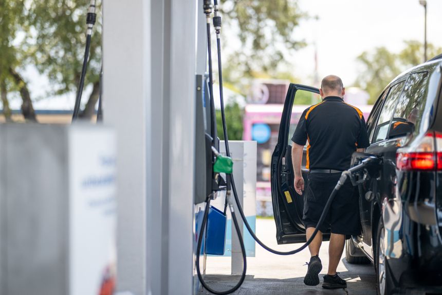 A person pumps gas at a gas station in Austin, Texas, on August 7, 2026.
