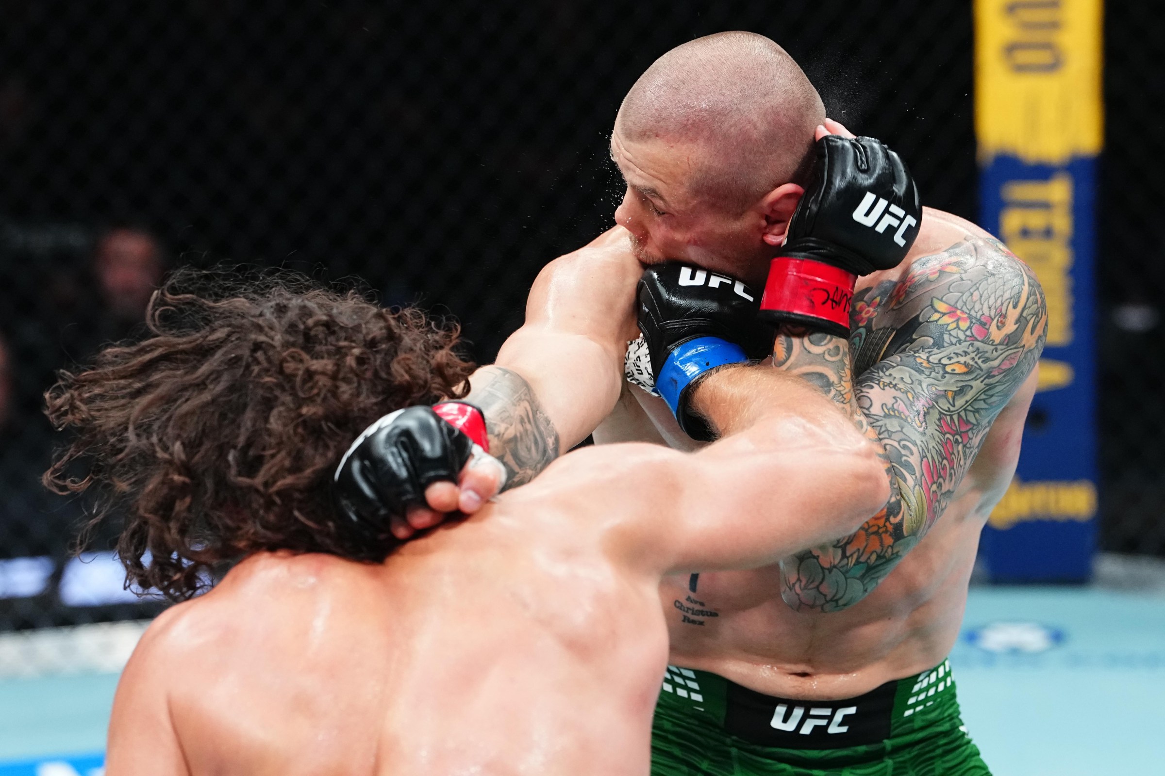 SALT LAKE CITY, UTAH - OCTOBER 03: Ismail Naurdiev of Russia punches Marvin Vettori of Italy in a middleweight fight during the UFC 332 event at Delta Center on October 03, 2026 in Salt Lake City, Utah. (Photo by Jeff Bottari/Zuffa LLC)