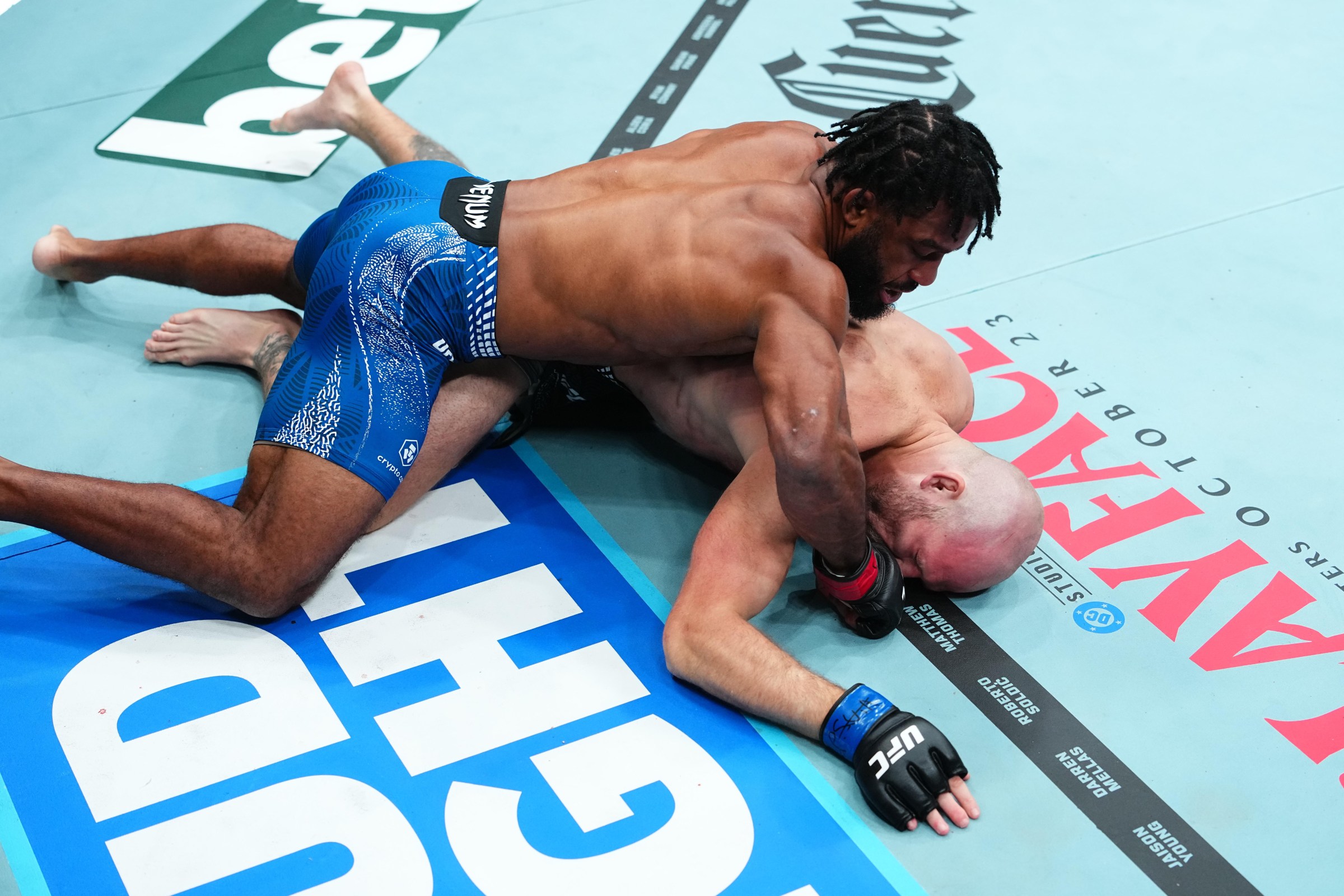 SALT LAKE CITY, UTAH - OCTOBER 03: (L-R) Jacobe Smith punches Bruce Whitehead in a welterweight fight during the UFC 332 event at Delta Center on October 03, 2026 in Salt Lake City, Utah. (Photo by Jeff Bottari/Zuffa LLC)
