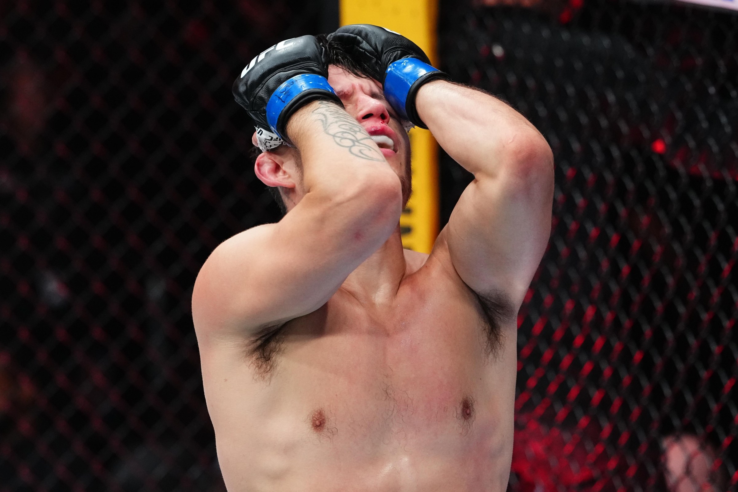 SALT LAKE CITY, UTAH - OCTOBER 03: Anthony Romero reacts after a TKO loss against Marcus McGhee in a featherweight fight during the UFC 332 event at Delta Center on October 03, 2026 in Salt Lake City, Utah. (Photo by Jeff Bottari/Zuffa LLC)