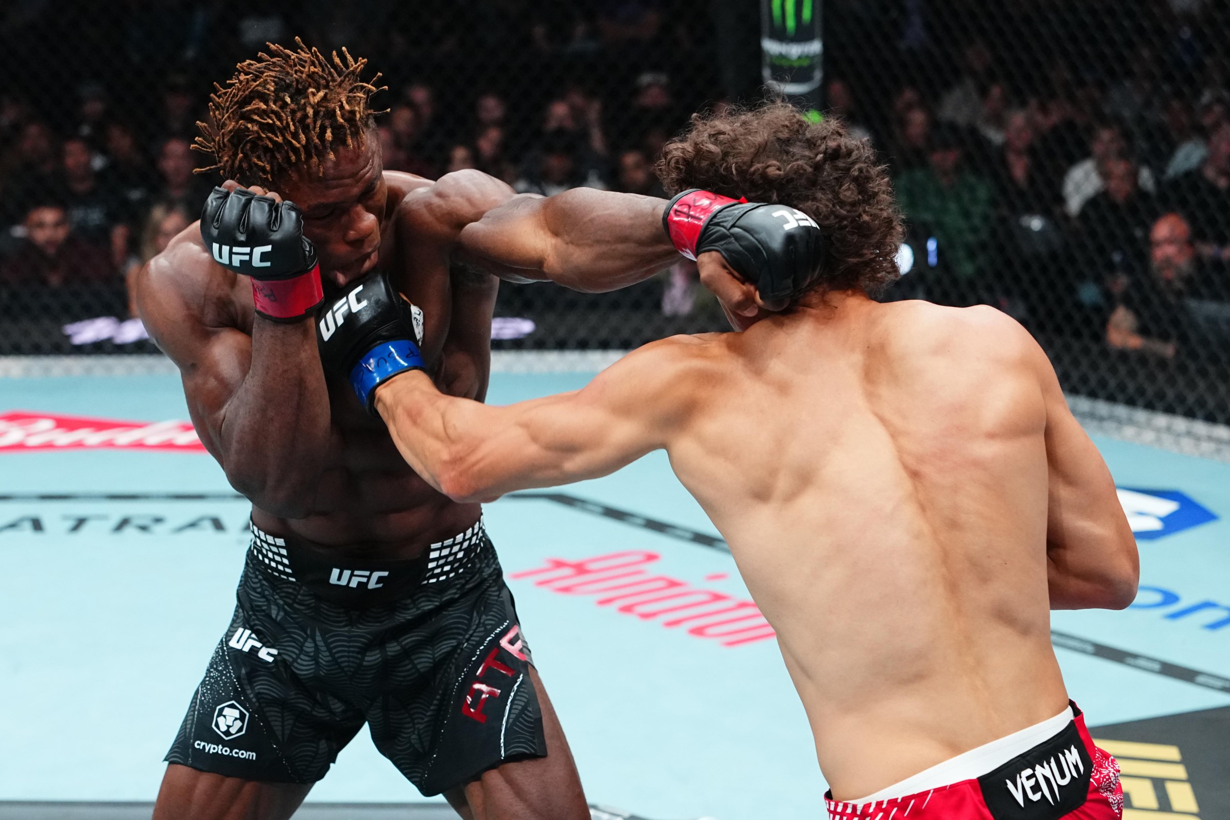 SALT LAKE CITY, UTAH - OCTOBER 03: Roman Kopylov of Russia punches Ateba Gautier of Cameroon in a middleweight fight during the UFC 332 event at Delta Center on October 03, 2026 in Salt Lake City, Utah. (Photo by Jeff Bottari/Zuffa LLC)