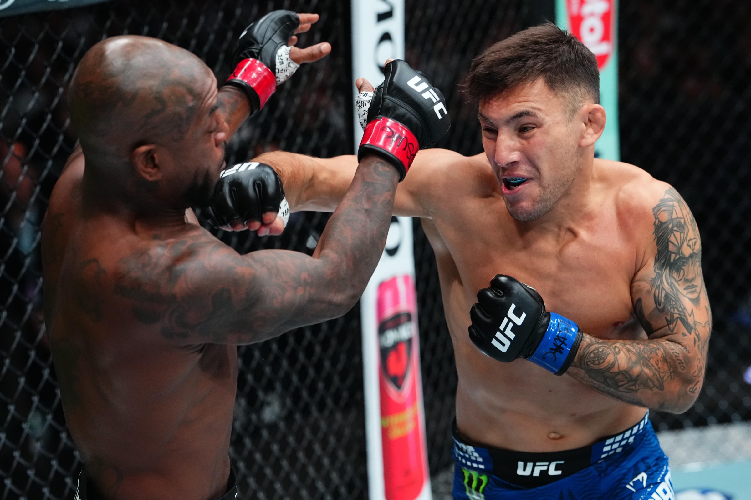 SALT LAKE CITY, UTAH - OCTOBER 03: (R-L) Esteban Ribovics of Argentina punches King Green in a lightweight fight during the UFC 332 event at Delta Center on October 03, 2026 in Salt Lake City, Utah. (Photo by Jeff Bottari/Zuffa LLC)