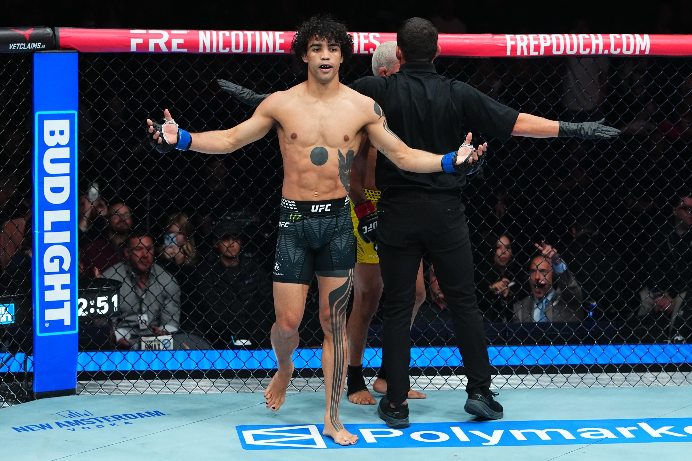 SALT LAKE CITY, UTAH - OCTOBER 03: Payton Talbott reacts after a TKO victory against Deiveson Figueiredo of Brazil in a bantamweight fight during the UFC 332 event at Delta Center on October 03, 2026 in Salt Lake City, Utah. (Photo by Jeff Bottari/Zuffa LLC)