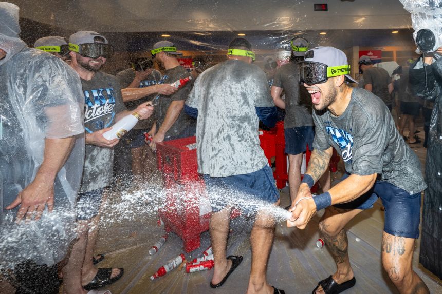 Members of the Tampa Bay Rays celebrate after knocking out the New York Yankees in the American League Division Series.